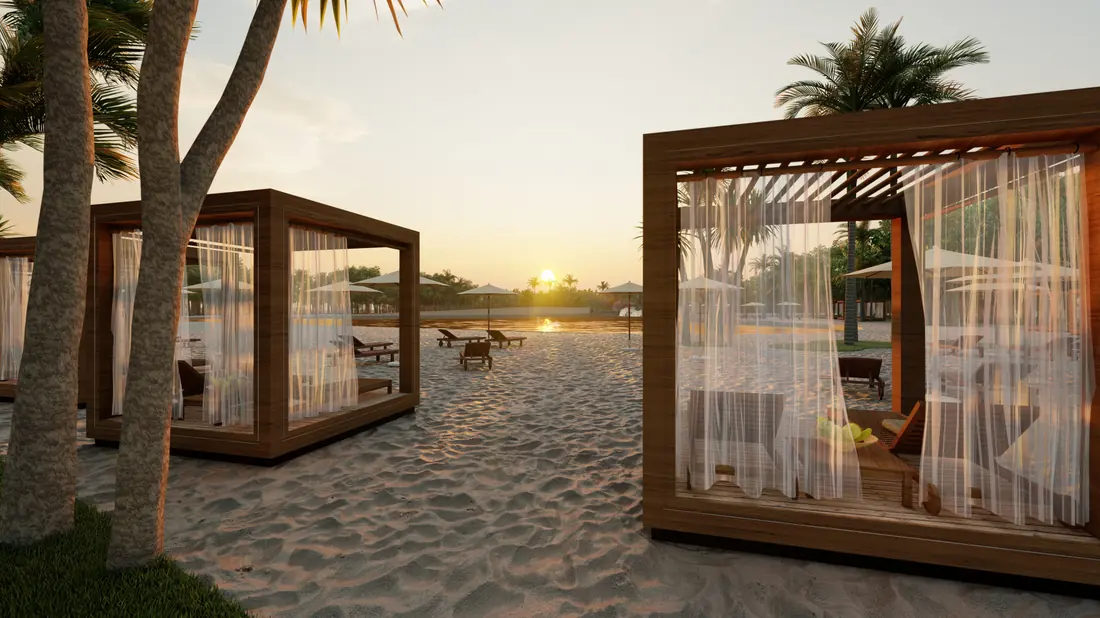 Imagen ilustrativa de cabañas de madera frente a la playa